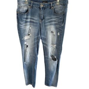 Supplies distressed ankle jeans